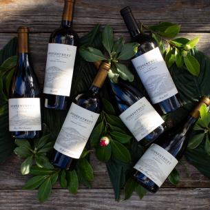 Bottles of Stonestreet Wines on a table with leaves